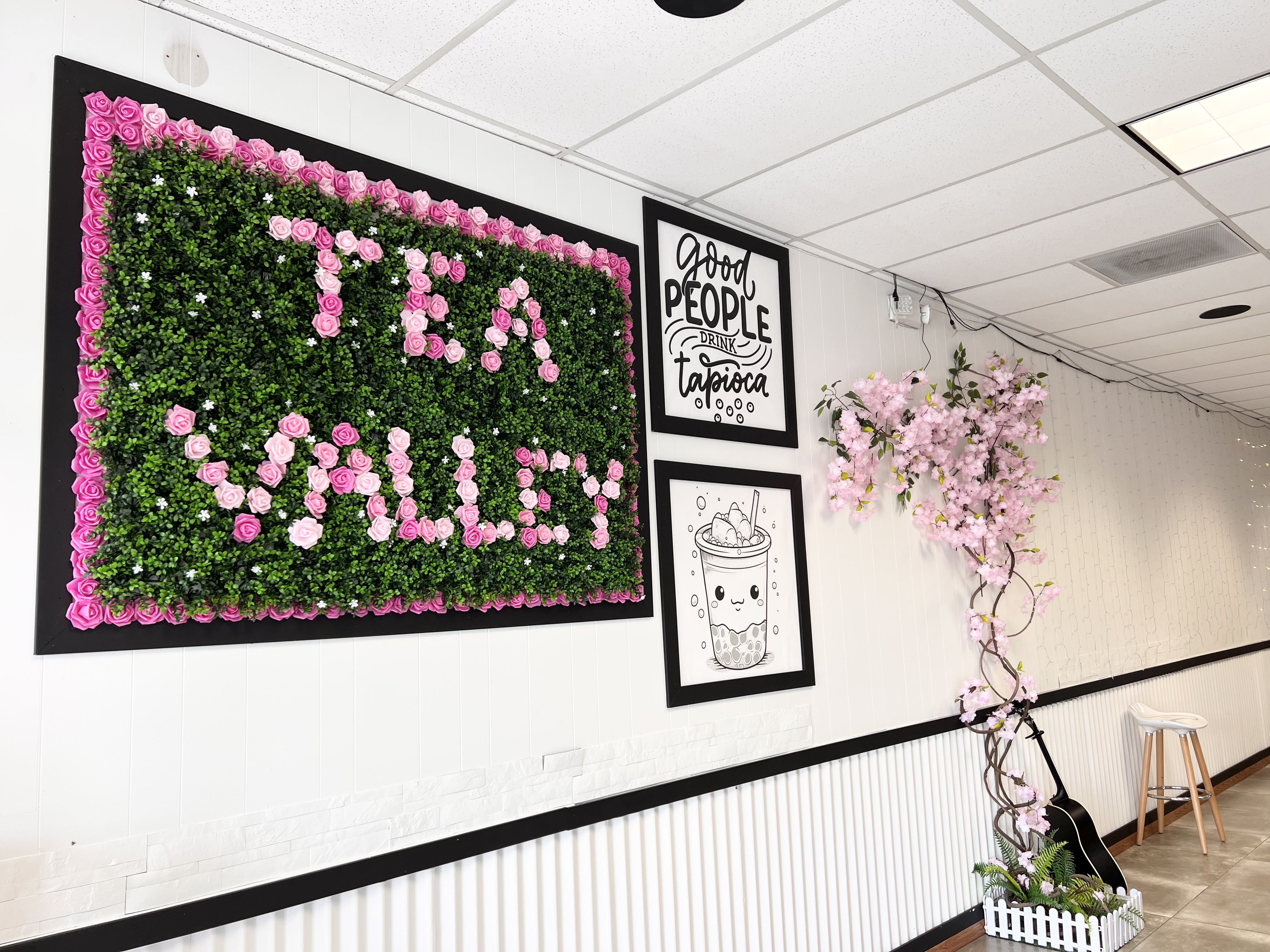 Tea Valley store interior with floral sign